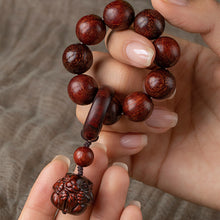 Load image into Gallery viewer, Rosewood Zodiac Fingertip Hand Twisting Toy
